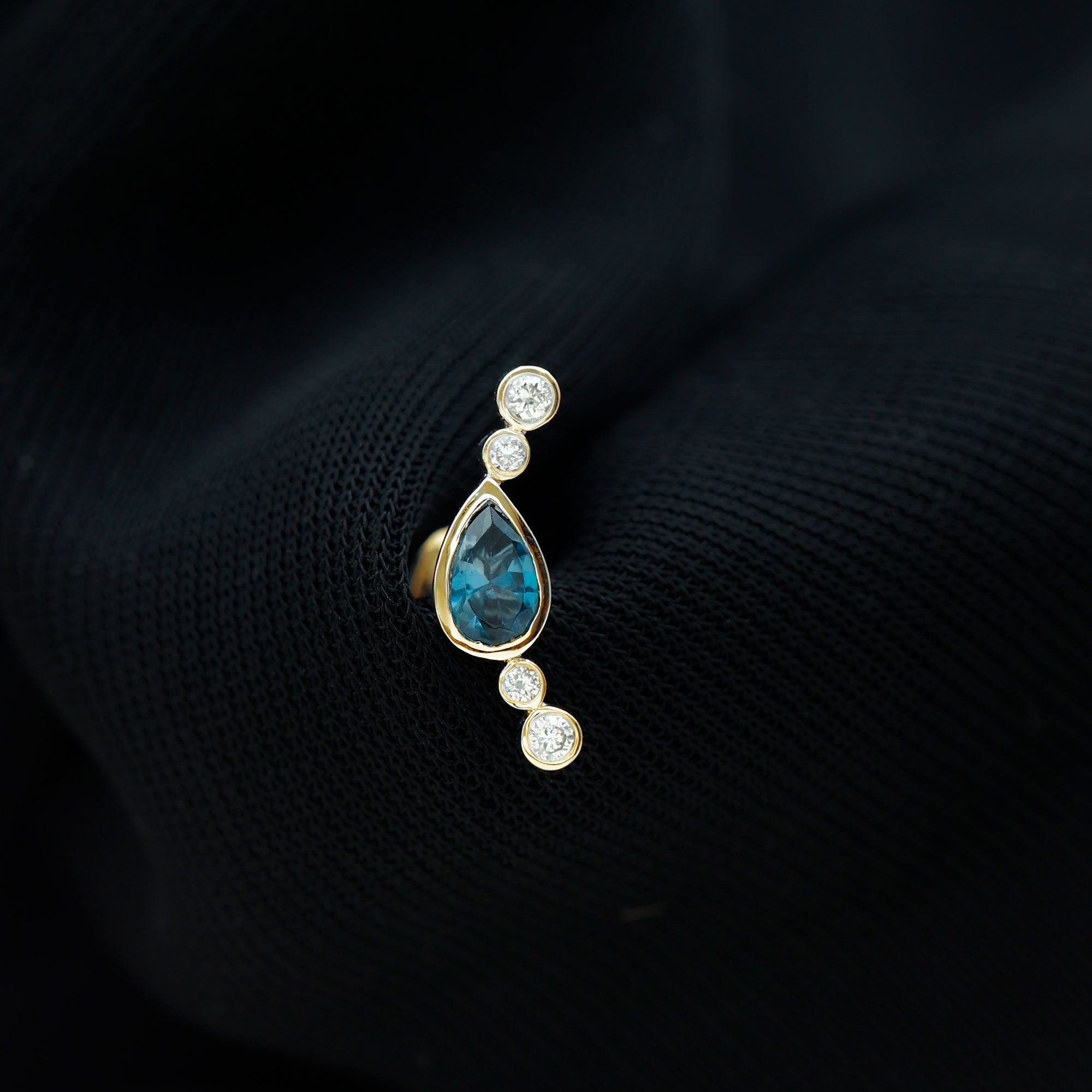 Rosec Jewels-Pear London Blue Topaz Crawler Earring with Moissanite