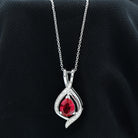 Pear Cut Created Ruby Teardrop Silver Pendant with Moissanite Accent - Rosec Jewels